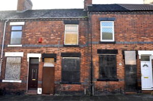 Boarded up house